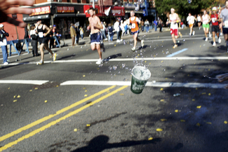 Dropping a cup at a water station in NY marathon  Color Awards Winners and Nominees
