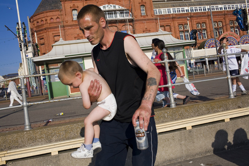 Man and Baby, Blackpool, UK Man and Baby, Blackpool, UK